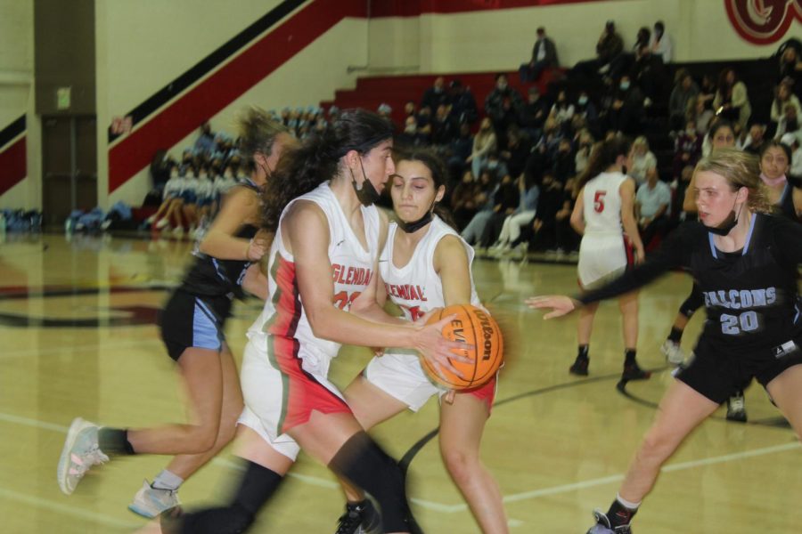 Varsity Basketball Teams Lose First League Games against Crescenta Valley