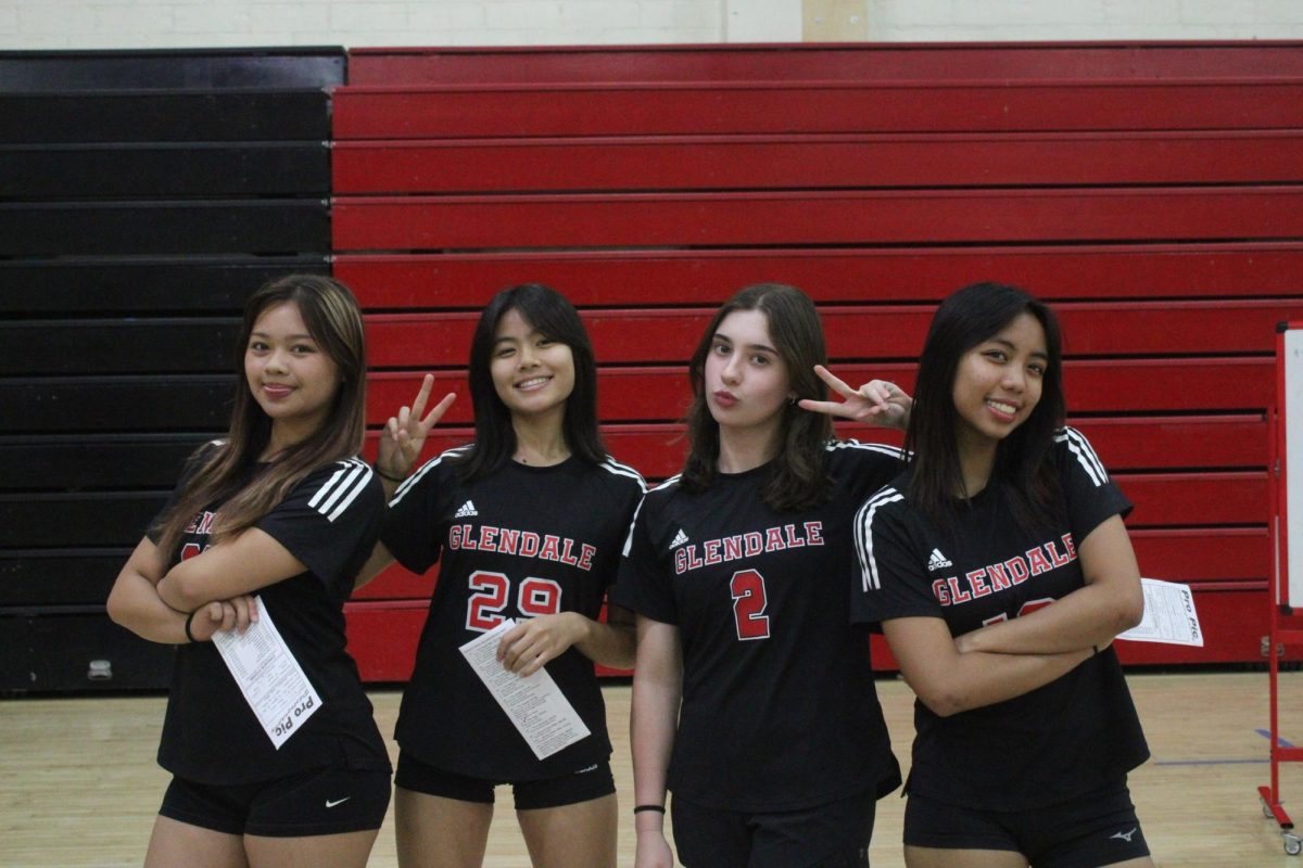 Emerson Whiting (second from right) and her volleyball teammates