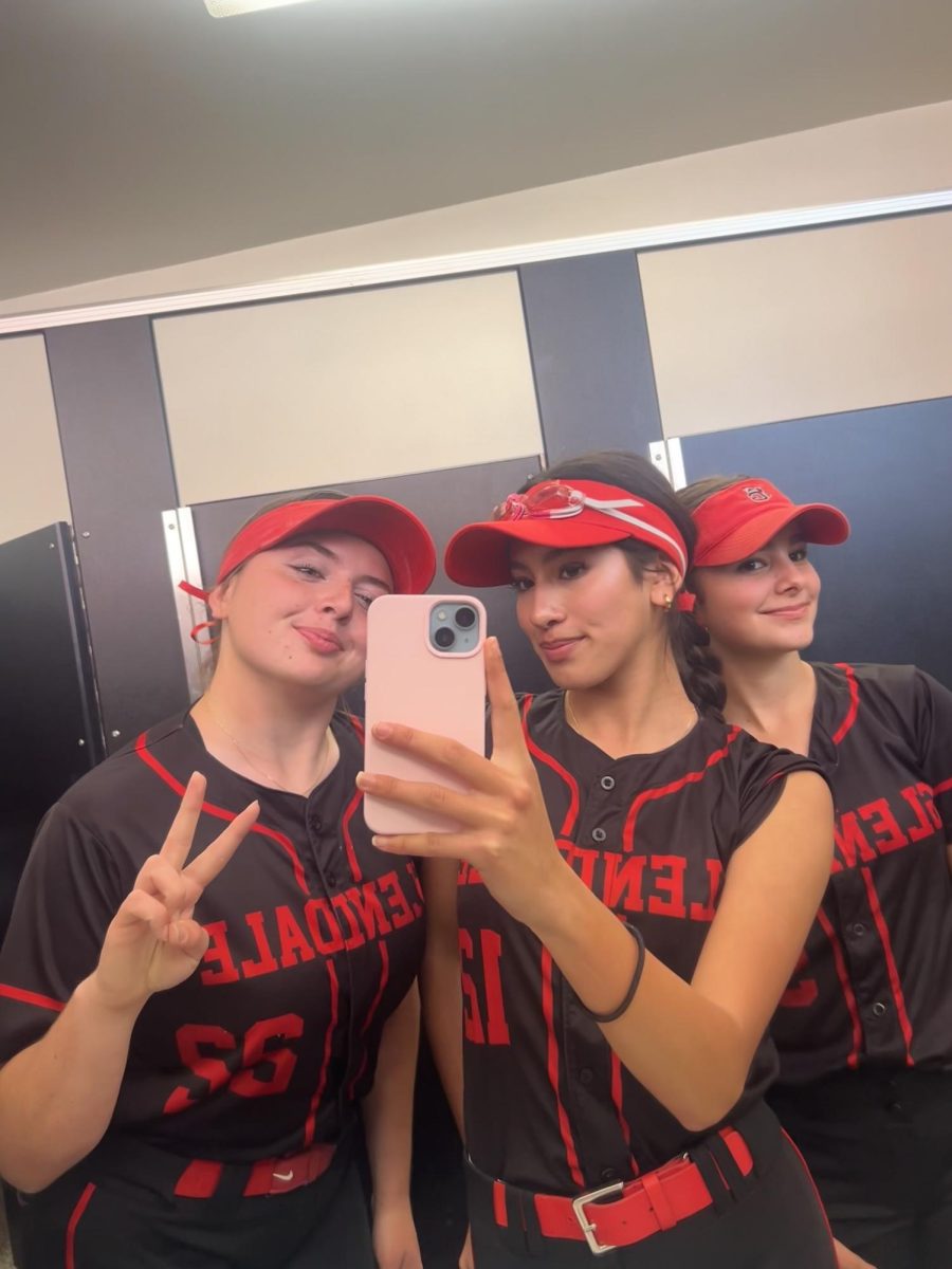 Jade Marquez (center) with teammates Rachel Francis and Brooke Aldrete