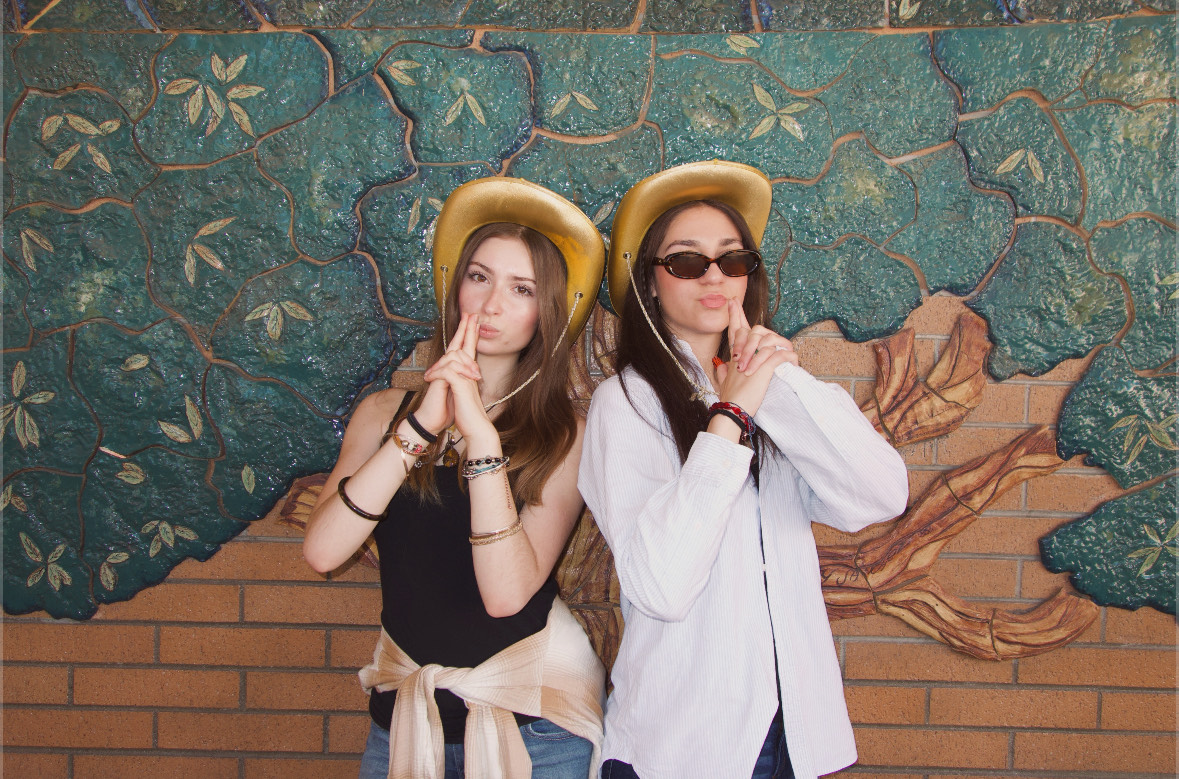 Polina Svigach (left) and Sophia Tshabourian have cowboy hats that are made of solid gold.